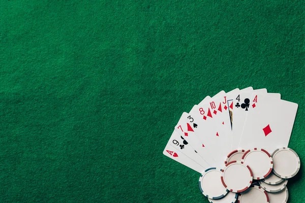 busid Texas Hold'em Bonus live dealer table showing community cards and player hole cards